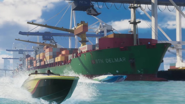 Two speedboats race past the green cargo ship BTN Delmar, loaded with containers including one marked Bilgeco.